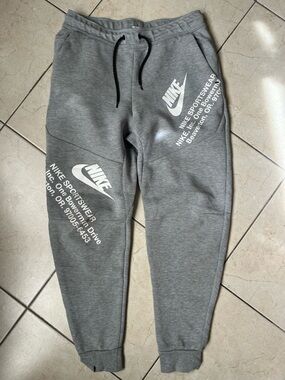 Nike Gray Jogger Sweatpants with White Logo Graphics